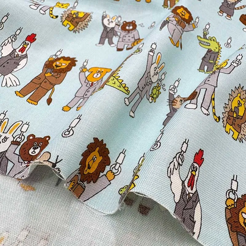 Yoko Saito 2026-05-A05 tissu coton animaux train menthe