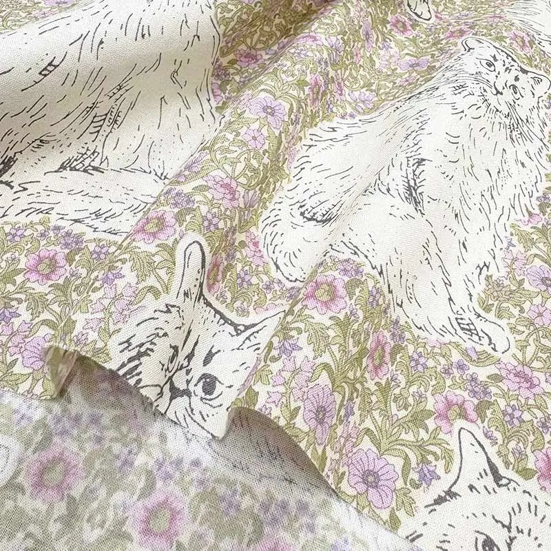 Yoko Saito Cat's Playground tissu coton bleu clair au mètre