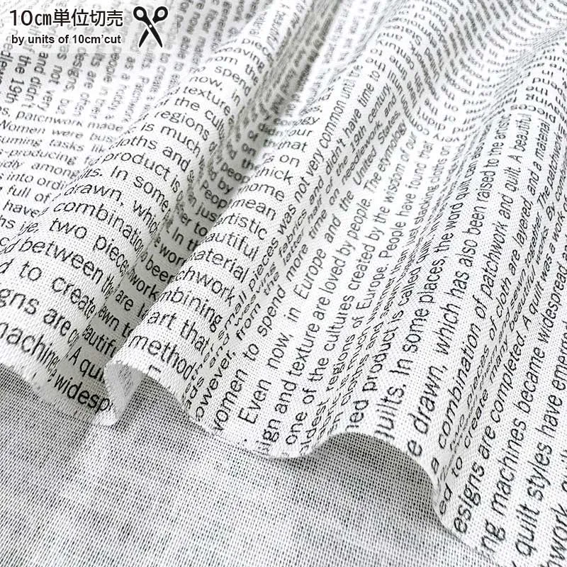 Yoko Saito 2026-05-A14 tissu coton lettres gris au mètre