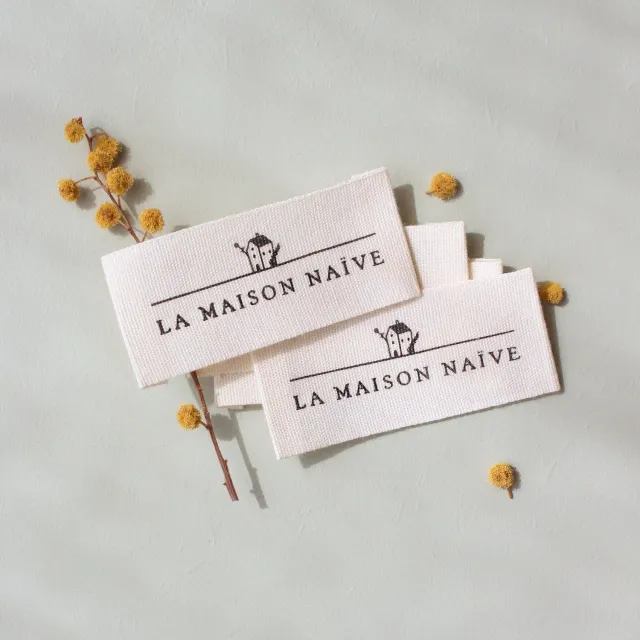 La Maison Naïve étiquette coton tissé ligue cancer