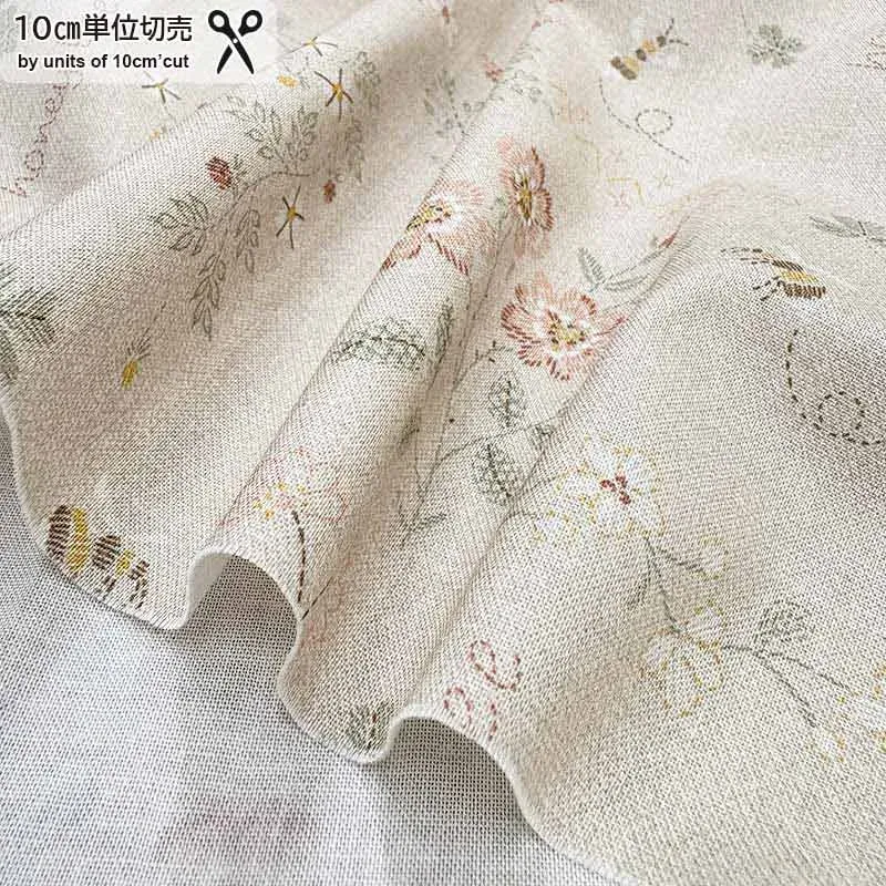 Yoko Saito 2026-01-A11 tissu coton beige fleurs abeilles au mètre