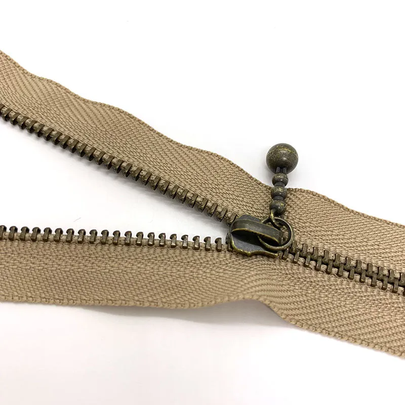 Yoko Saito lot 3 fermetures 16 cm goutte gris beige