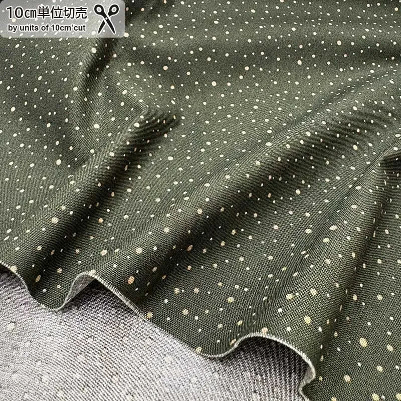 Yoko Saito 2026-03-A12 tissu coton pois kaki fond vert