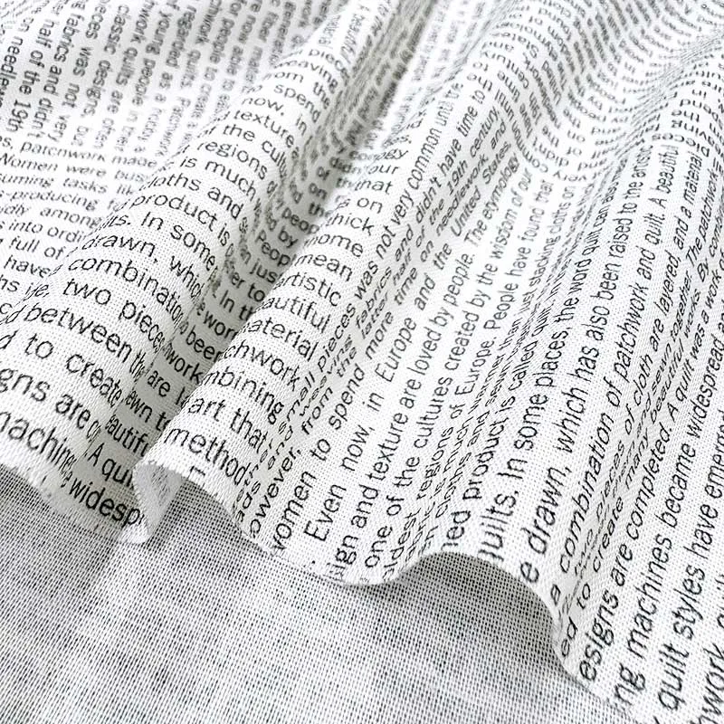 Yoko Saito 2026-05-A14 tissu coton lettres gris au mètre