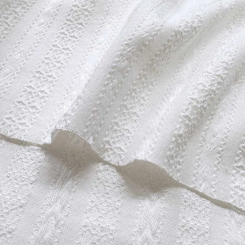Yoko Saito dentelle leno dobby coton écru rayé au mètre 110 cm