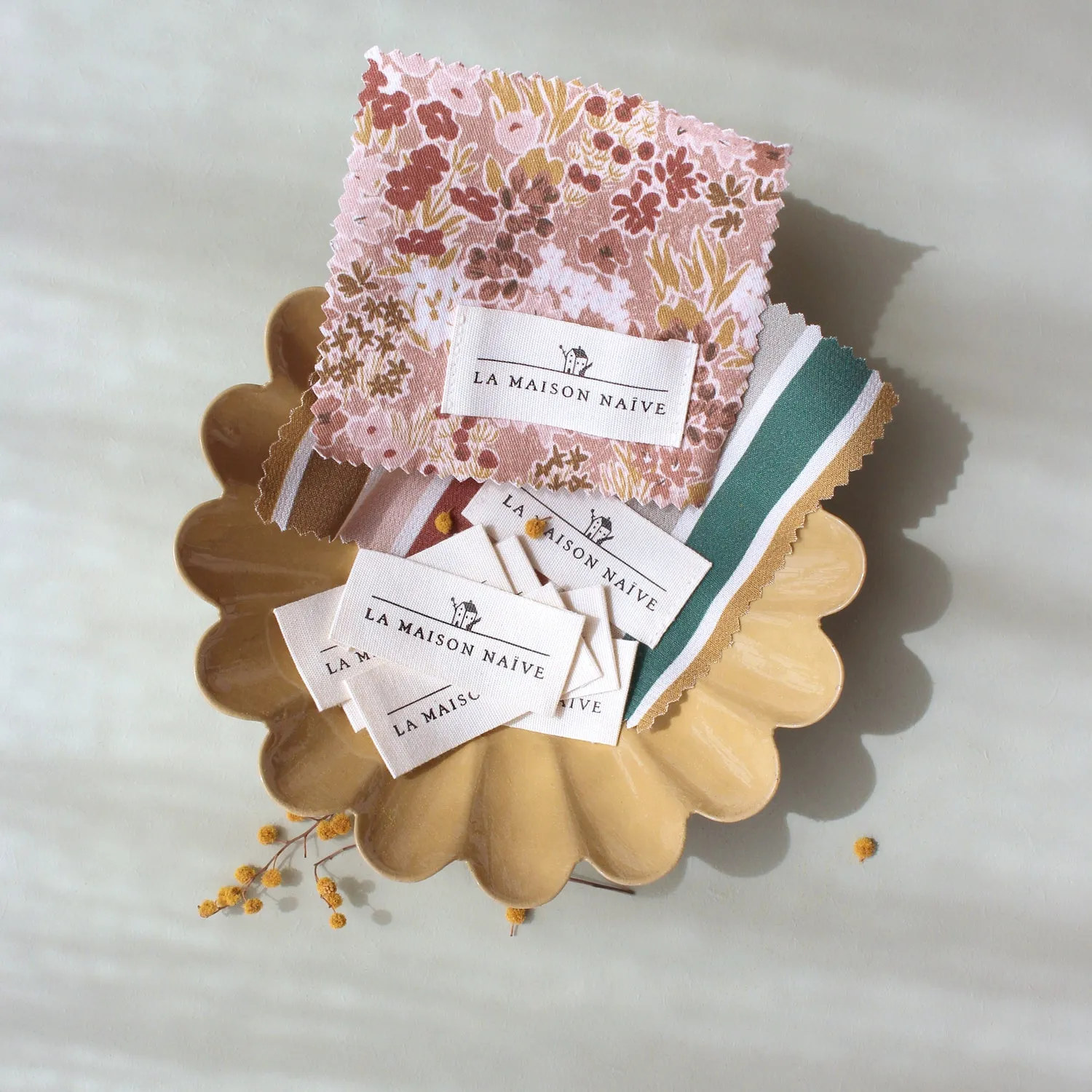 La Maison Naïve étiquette coton tissé ligue cancer