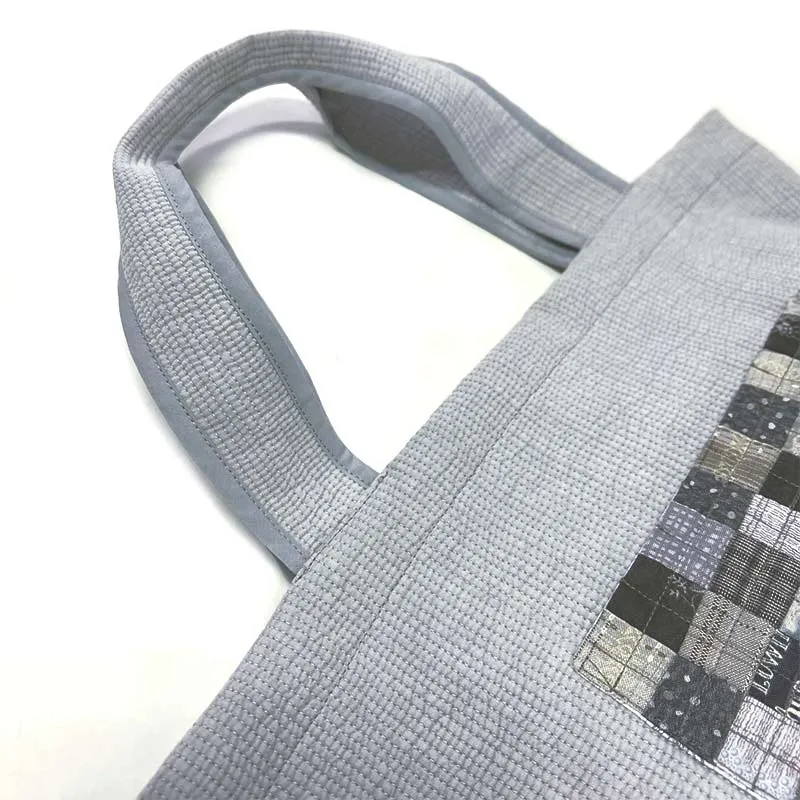 Yoko Saito Nubi kit tote bag matelassé gris à poche