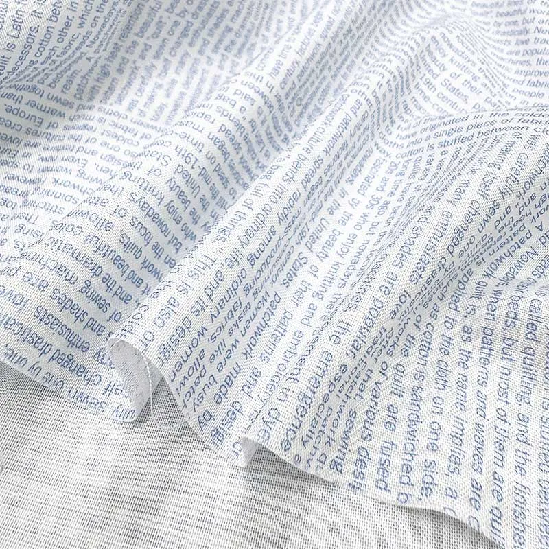 Yoko Saito 2026-05-A13 tissu coton bleu lettres au mètre