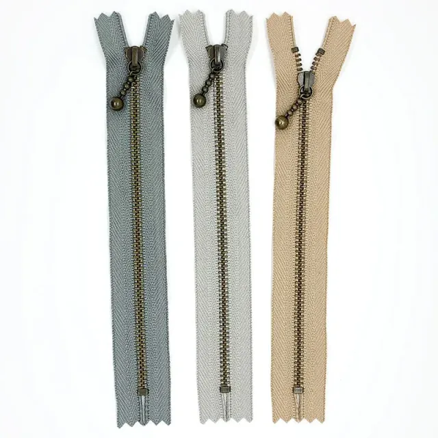 Yoko Saito lot 3 fermetures 16 cm goutte gris beige