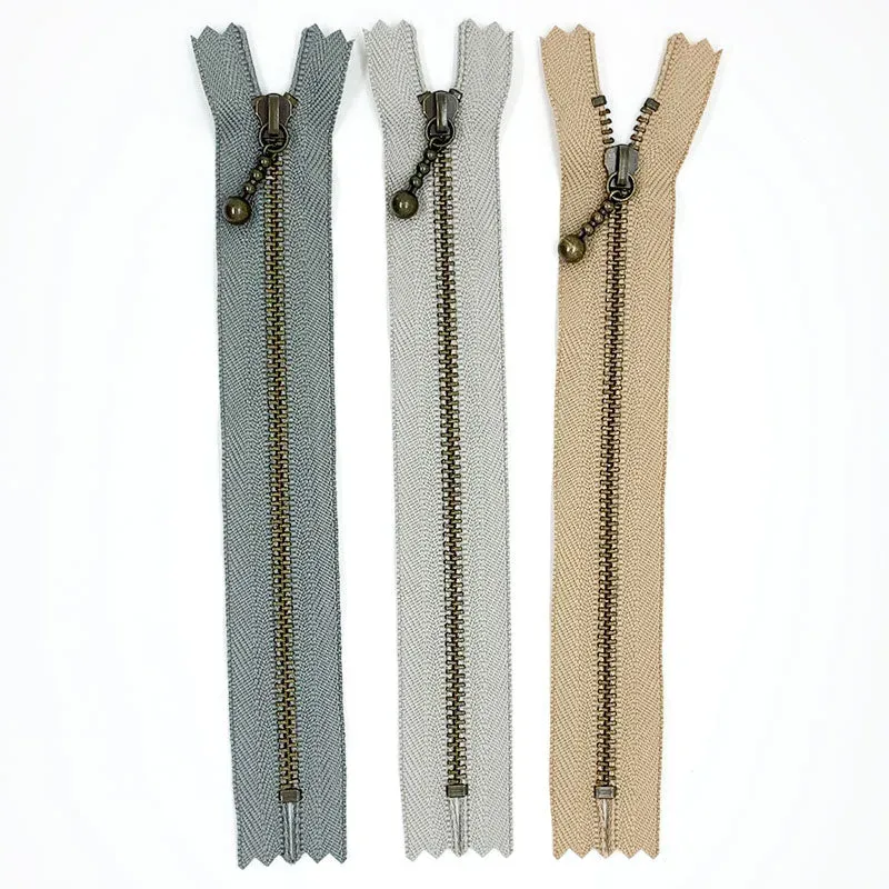 Yoko Saito lot 3 fermetures 16 cm goutte gris beige